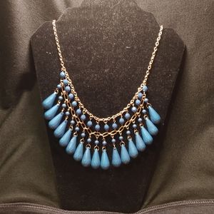 9 in blue beaded necklaces